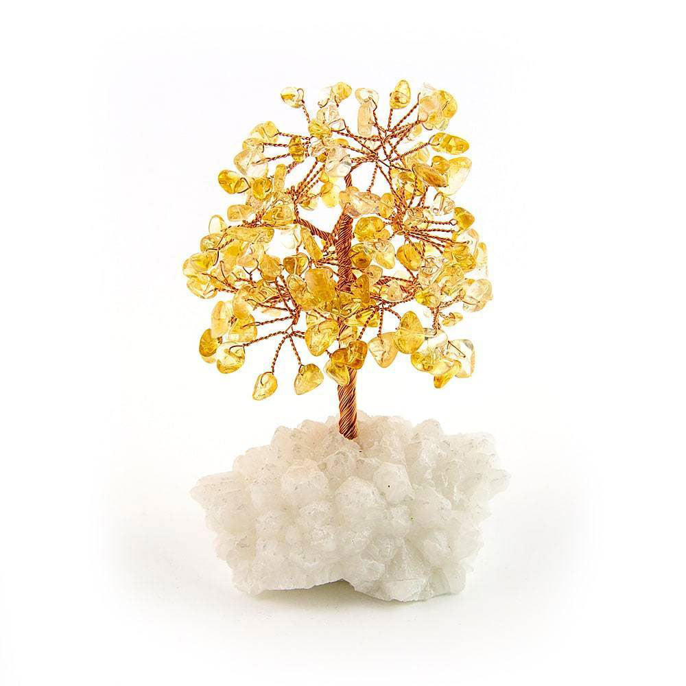 Citrine copper tree on white crystal base against white background for spiritual home decor.