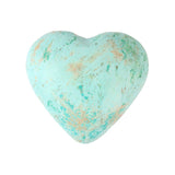 Front view of polished turquoise heart crystal on a white background.