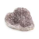 Angled view of small Amethyst Gemstone Heart revealing depth and texture of natural amethyst crystals.