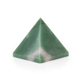 Large green quartz crystal pyramid for chakra alignment and space cleansing.