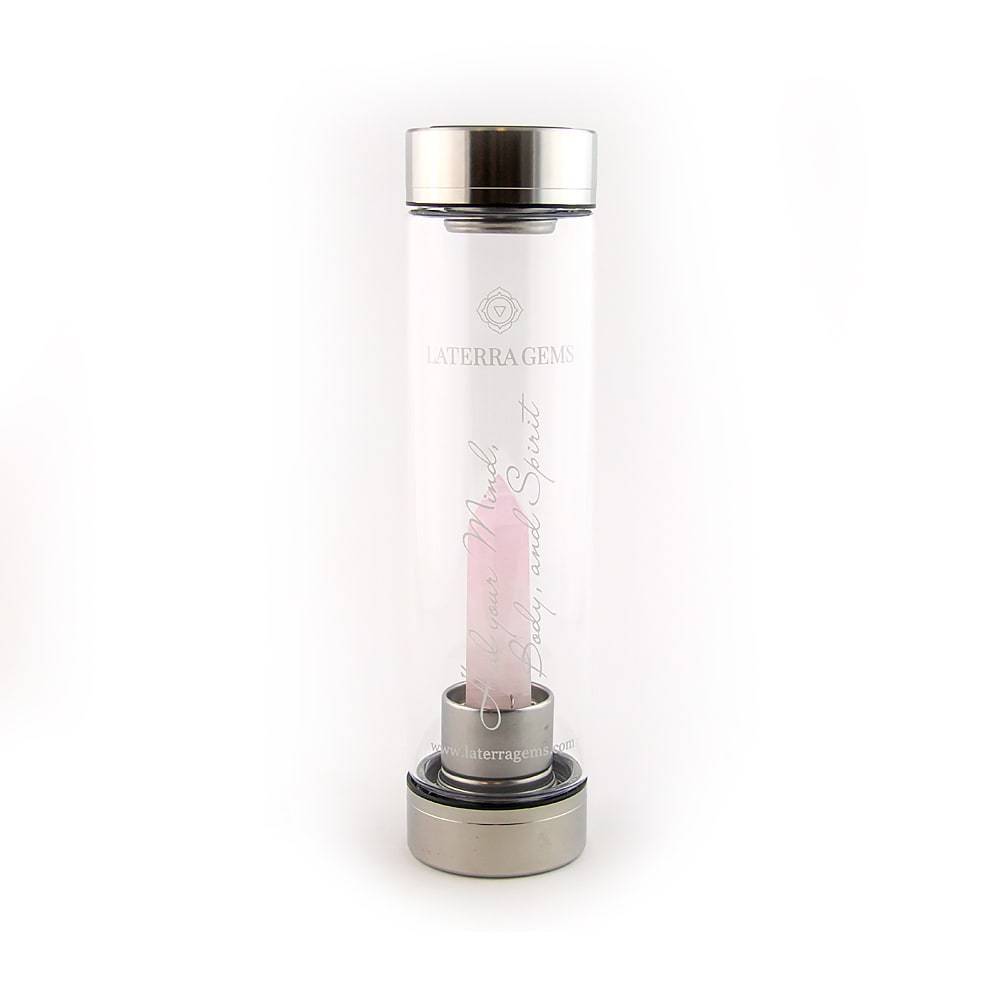 Laterra Gemstone Water Bottle with rose quartz crystal point insert inside clear glass bottle.
