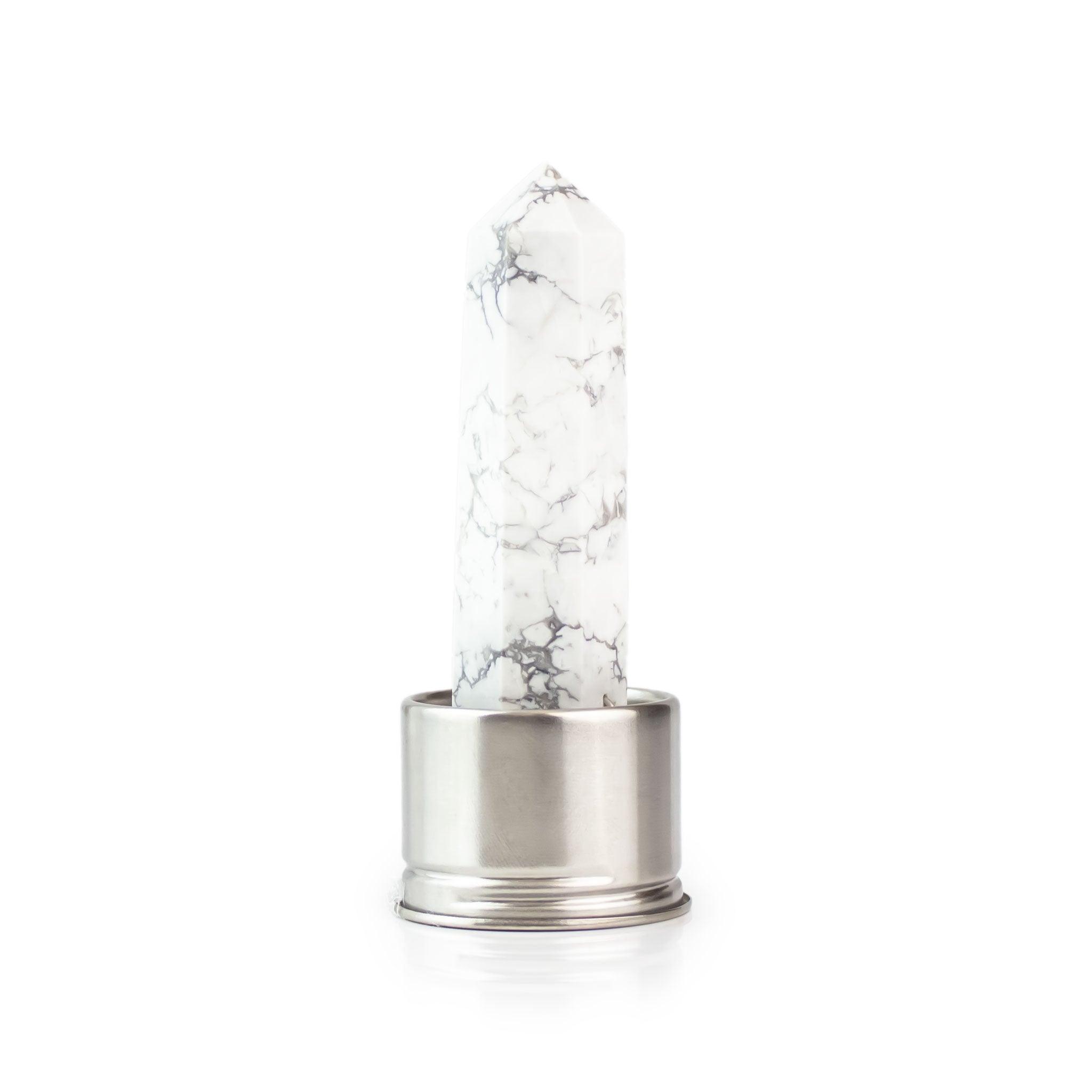 White howlite attachment for Laterra Gemstone Water Bottle, polished crystal point in metal base on white background.