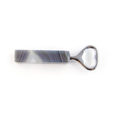 Agate stone bottle opener on a white background.