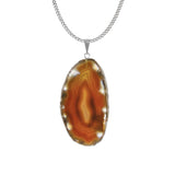 Close-up of Agate Slice Stone Pendant highlighting detailed banding and polished finish.