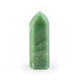 Front view of polished Green Quartz Point standing upright, showing green hues and natural internal inclusions.