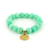 Matte green aventurine bracelet with gold textured disk charm.