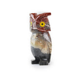 Soapstone owl carving viewing right angle showing texture and form.