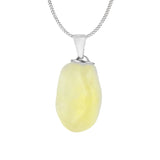 Close-up of tumbled Yellow Aventurine Stone Pendant showing polished crystal on metal-tone chain.