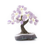 Small Amethyst bonsai tree with tumbled gemstone leaves on raw amethyst base.