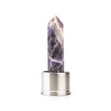 Chevron amethyst attachment for Laterra Gemstone Water Bottle, polished crystal point in metal base on white background.