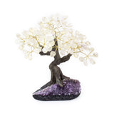 Large Crystal Quartz bonsai tree sculpture with tumbled clear quartz leaves on amethyst foundation.