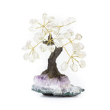 Small Crystal Quartz bonsai tree with tumbled clear quartz leaves on raw amethyst base.