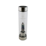 Pisces Laterra Gemstone Water Bottle with rainbow fluorite crystal attachment inside clear glass bottle on white background.