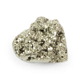Angled view of pyrite heart showing polished underside with natural craters