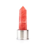 Red smelting quartz attachment for Laterra Gemstone Water Bottle, polished crystal point in metal base on white background.