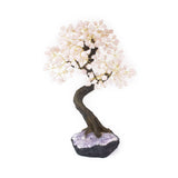 Oversized Rose Quartz bonsai tree with tumbled stones on amethyst base for luxury crystal décor and meditation.