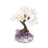 Small Rose Quartz bonsai tree with tumbled gemstone leaves on raw amethyst base.