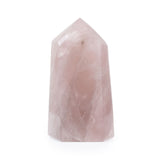 Rose quartz point on white background, front view showing polished tip and soft pink tone.