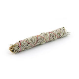 Large sage smudge stick isolated on white background for home cleansing and energy purification.
