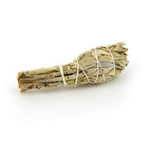 Small sage smudge stick for energy cleansing, meditation, and spiritual rituals.