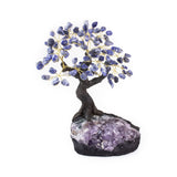 Large Sodalite bonsai tree sculpture with tumbled sodalite leaves on amethyst foundation.